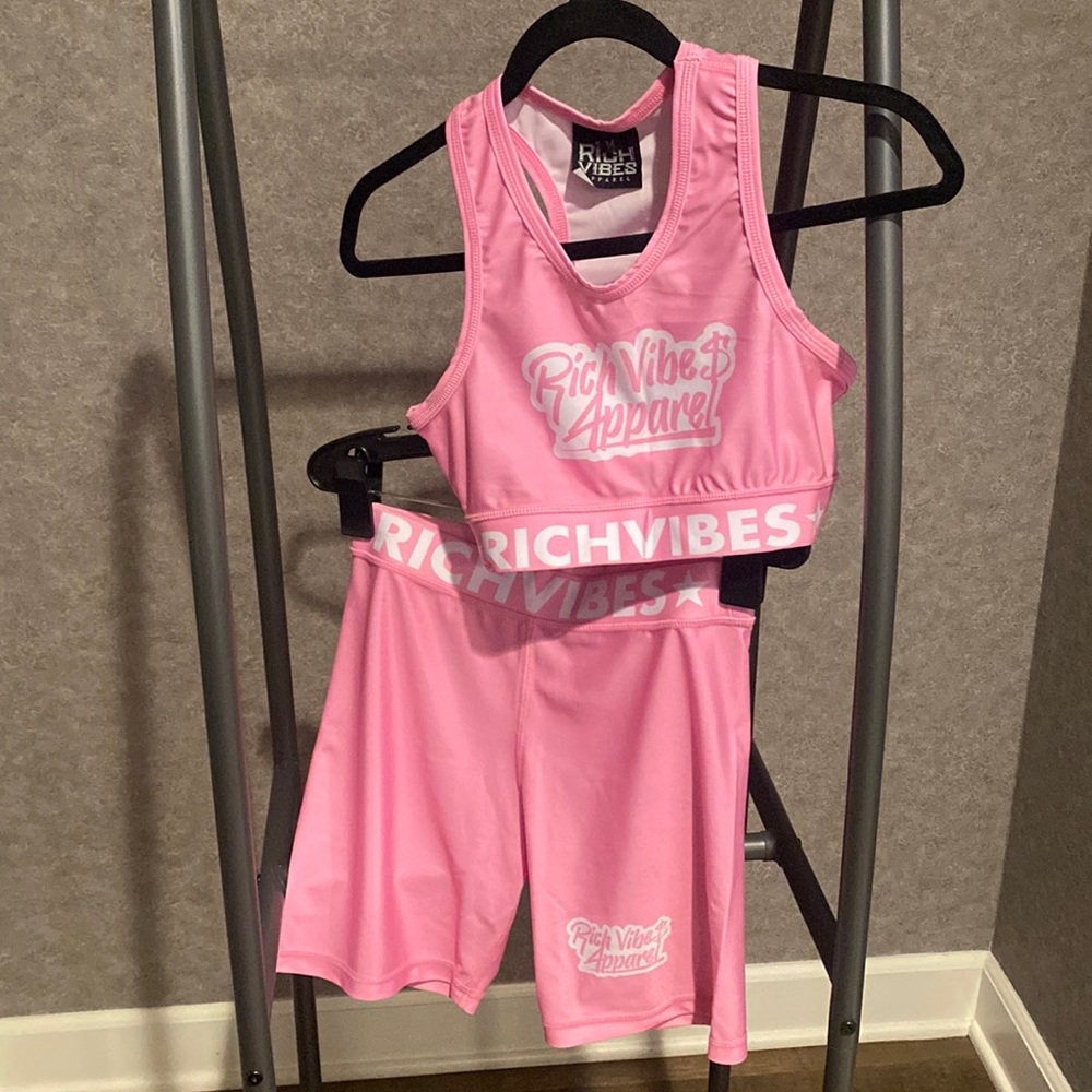 Pink workout set, sports bra, biker shorts. Size medium.